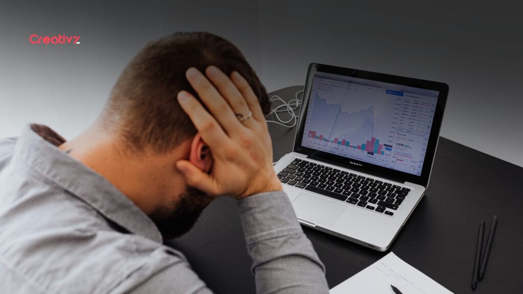 Founder reviewing flat revenue metrics despite increasing traffic showing systems problem not traffic problem