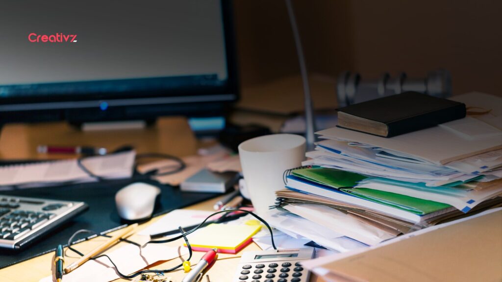 Disorganized sales process illustrated by scattered documents and disconnected data on a desk