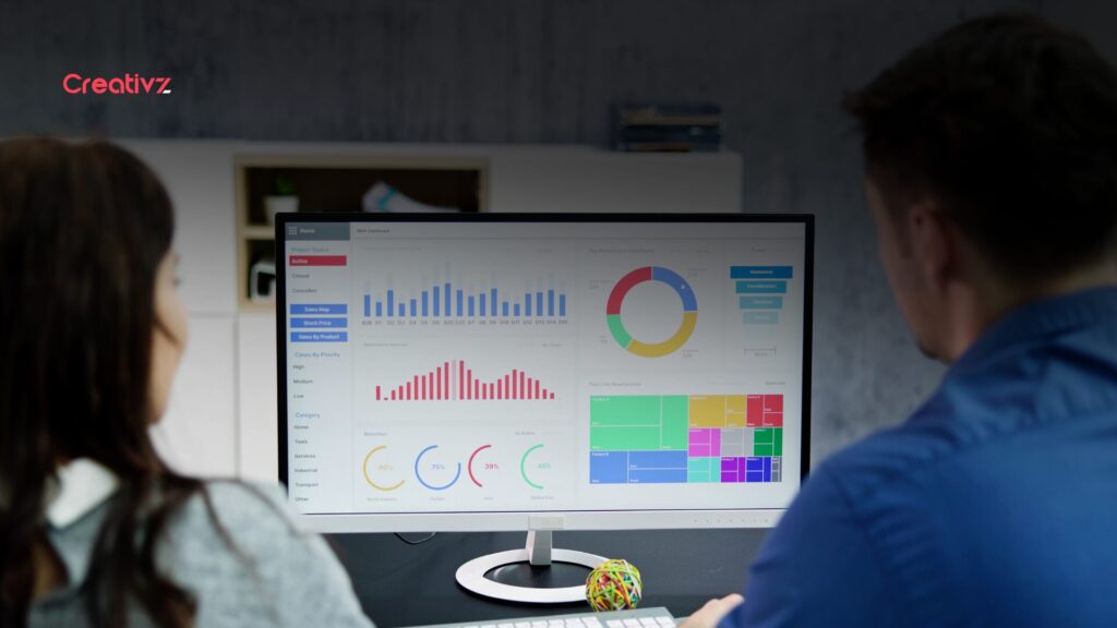 Business owner reviewing first-party data analytics dashboard on a laptop