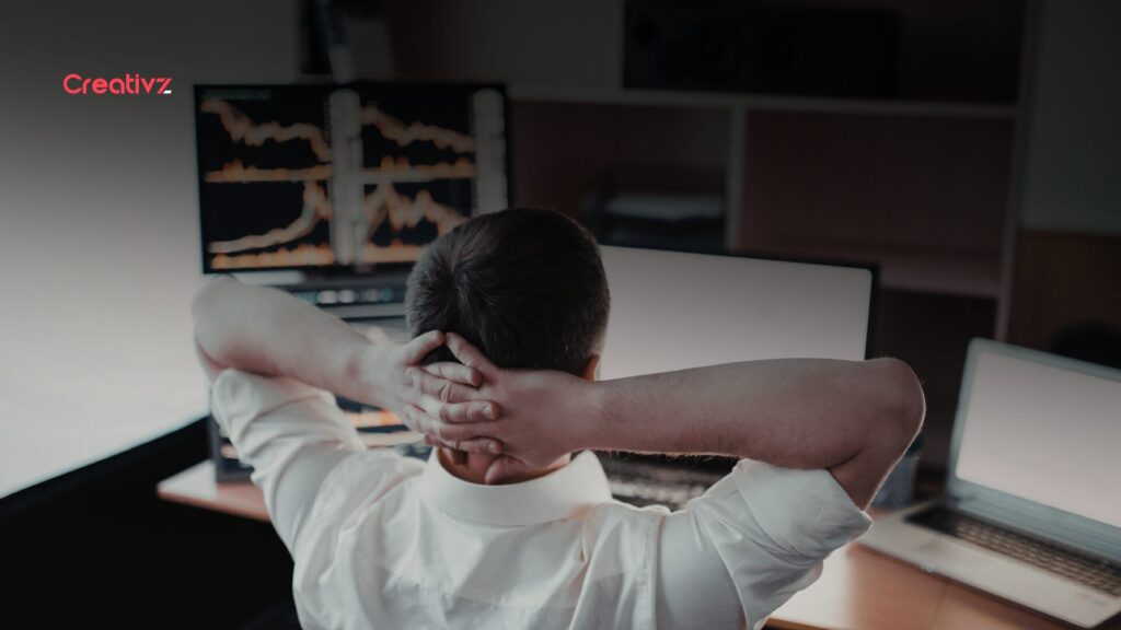 Business owner overwhelmed by disconnected marketing tools and data silos on multiple screens