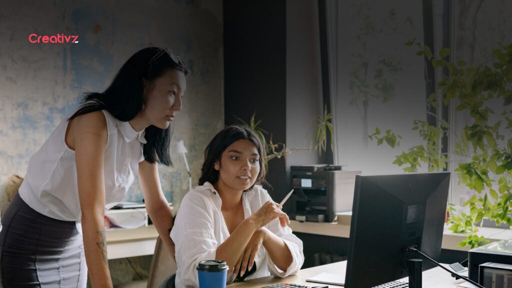 Team working efficiently in a calm workspace using connected marketing tools, showing how integrated systems improve workflow and productivity