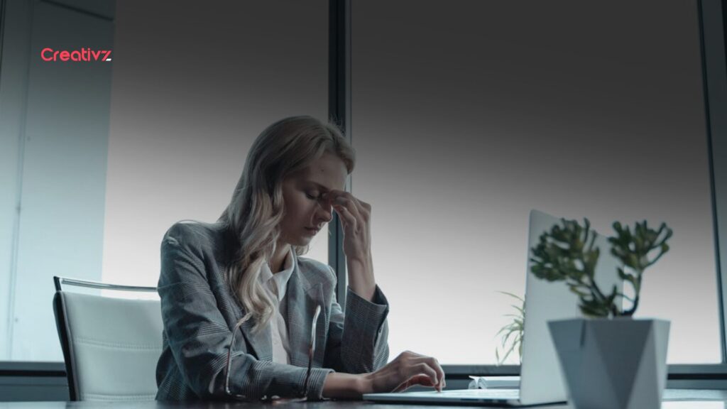 Overwhelmed founder reviewing messy and disconnected business data across multiple systems
