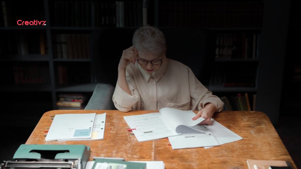 Founder reviewing a B2B service proposal and pricing strategy before presenting it to a client.