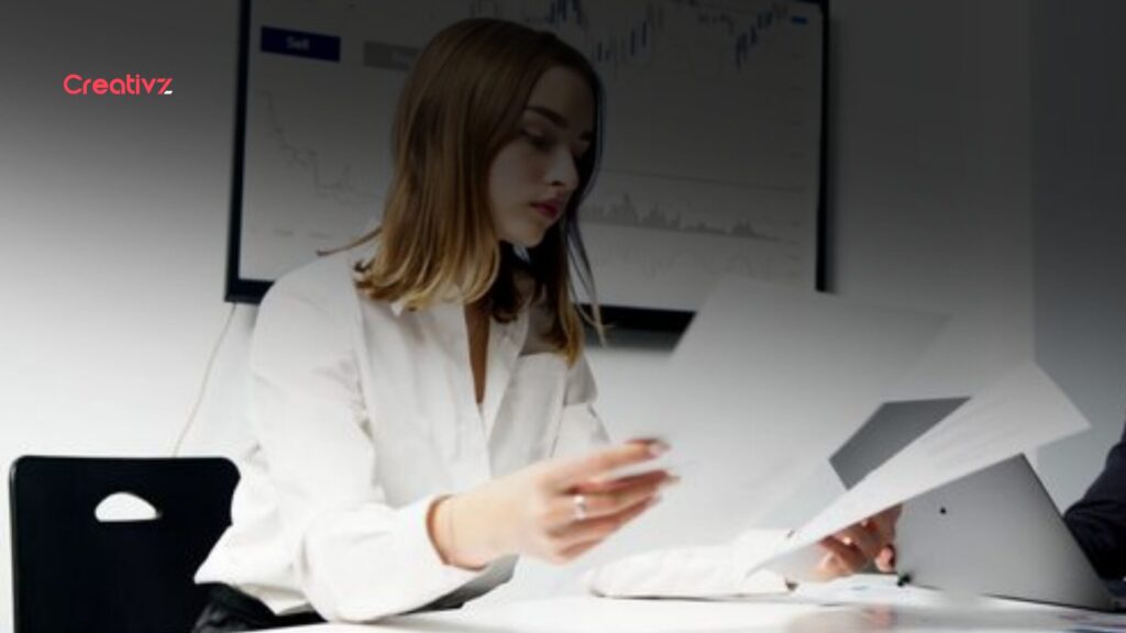 Business leader reviewing CRM activity and lead follow-up processes after a landing page conversion.