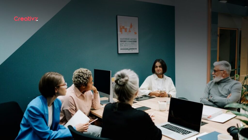 Business team reviewing CRM reports to identify reporting and sales process issues.