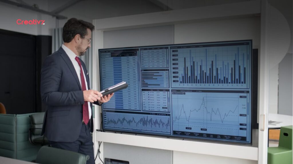 Operations manager reviewing CRM reports and automated sales workflows.