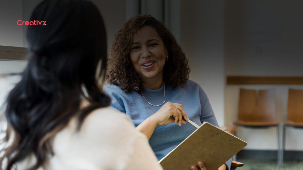 Account manager meeting with an existing client to discuss business growth opportunities.
