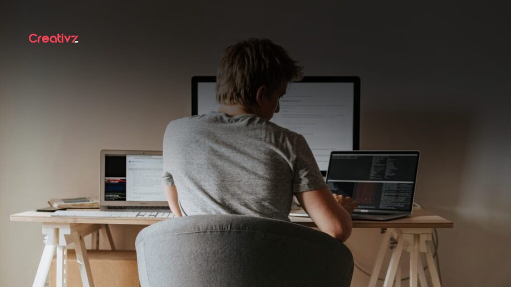 Operations professional monitoring automated workflows and business systems.