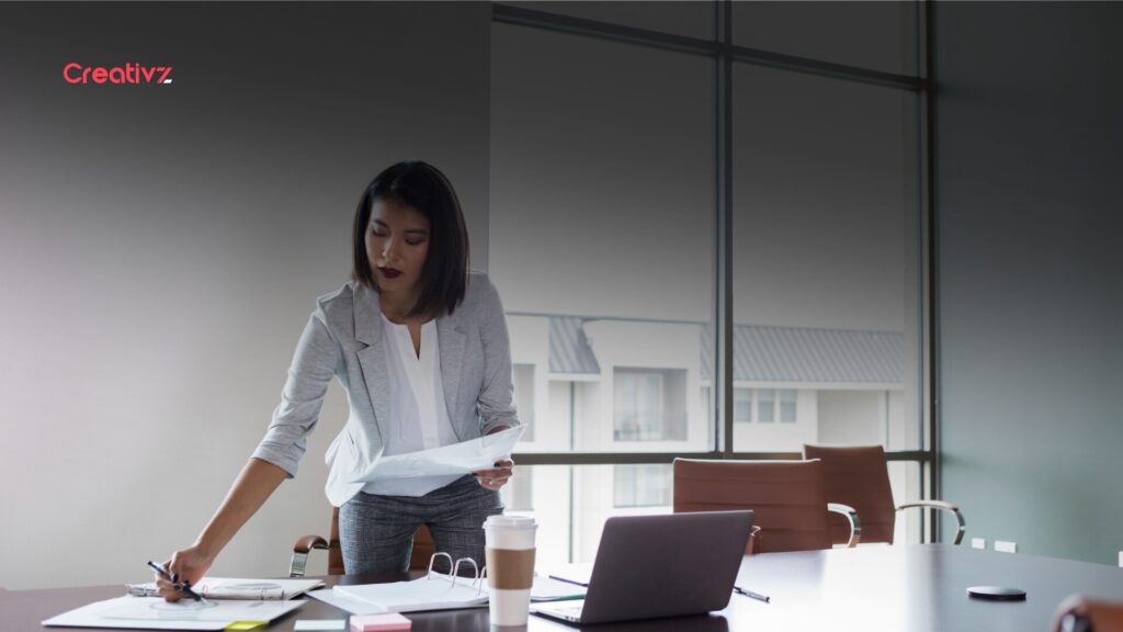 Consultant preparing client information before a professional services meeting.